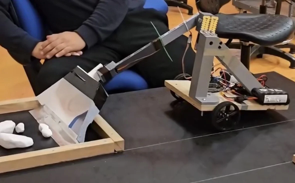 The collection robot with its scooping mechanism open.