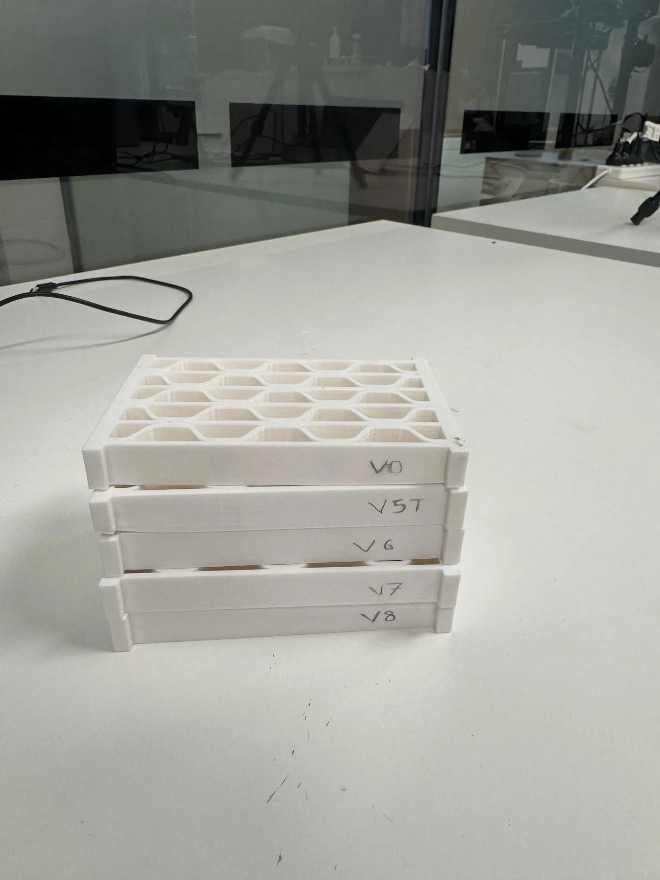 Physical isogrid variants produced through 3D printing.