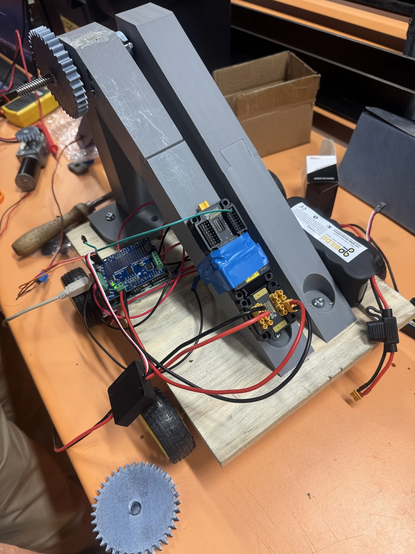 Wiring and motor integration in progress.